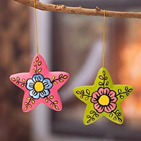 Ceramic ornaments, 'Ayacucho Bloomed Stars' (pair) - 2 Colorful Ceramic Star-Shaped Floral Christmas Ornaments
