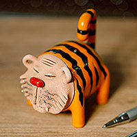 Ceramic figurine, 'Striped Roars' - Handcrafted Brown and Orange Tiger Figurine from Uzbekistan