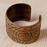 Wood cuff bracelet, 'Palace Mark' - Vine-Patterned Walnut Wood Cuff Bracelet from Kazakhstan