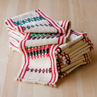 Cotton and wool baskur home accent, 'Divine Greetings' - Woven Ivory and Red Cotton and Wool Baskur Home Accent
