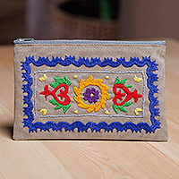 Hand-embroidered suzani cotton cosmetic bag, 'Chic Flair' - Cotton Cosmetic Bag with Suzani Hand-Embroidered Motifs
