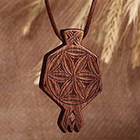 Wood pendant necklace, 'Harmonious Talisman' - Hand-Carved Geometric Walnut Wood Pendant Necklace