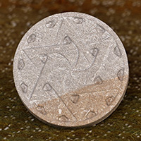 Felsite stone magnet, 'Harmonious Bonds' - Hand-Carved Star-Themed Round Felsite Stone Magnet