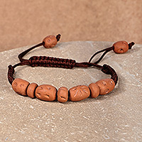 Terracotta beaded macrame pendant bracelet, 'Natural Delight' - Terracotta Beaded Pendant Bracelet with Brown Macrame Cord