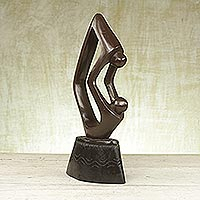 Wood sculpture Daddy s Here Ghana