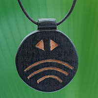 Men's teak wood pendant necklace, 'Onyame Aniwa' - Men's Wood Pendant Necklace