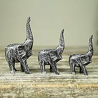 Wood sculptures, 'Cheerful Black Elephants' (set of 3) - Set of 3 Hand Carved Wood African Elephant Sculptures