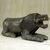 Wood figurine, 'Brave Lion' - Aluminum Coated Wooden Lion Crouched in Kneeling Pose thumbail
