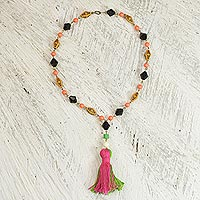 Cotton and recycled plastic pendant necklace, 'Caretaker' - Cotton and Recycled Plastic Pendant Necklace from Ghana