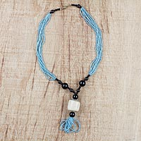 Horn and recycled glass beaded pendant necklace, 'Mother's Embrace' - Sky Blue and Black Beaded Glass Horn Pendant Necklace