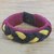 Men's wristband bracelet, 'Jungle Dawn' - Men's Black and Yellow Braided Cord Wristband Bracelet thumbail