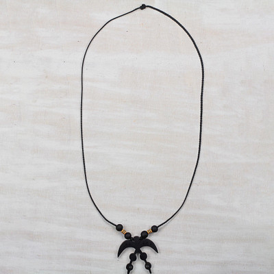 Wood pendant necklace, Akofena Courage