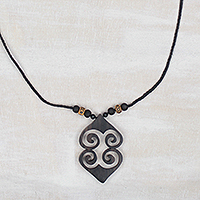 Wood pendant necklace, 'Asase Ye Duru' - Adinkra Asase Ye Duru Sese Wood Pendant Necklace from Ghana