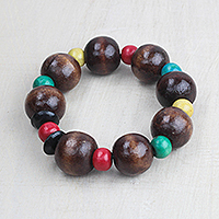Wood beaded stretch bracelet, 'Joyful Together' - Brown and Multi-Color Wood Bead Stretch Bracelet from Ghana