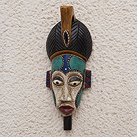Featured review for African wood mask, Benevolent Emiyi