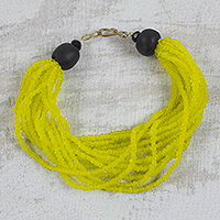Recycled glass beaded torsade bracelet, 'Divine Yellow' - Handmade Yellow and Black Recycled Glass Beaded Bracelet
