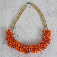 Recycled plastic beaded necklace, 'Me Na Ye' - Orange and Gold Recycled Plastic Beaded Necklace from Ghana