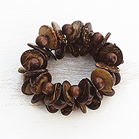 Wood and coconut shell beaded bracelet, 'Celebrate Nature' - Brown Sese Wood Double Strand Beaded Bracelet with Discs
