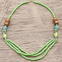 Recycled glass and wood beaded necklace, 'Green Nyhira' - Green Recycled Glass and Sese Wood Beaded Necklace