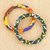 Cotton bangle bracelets, 'Beautiful Today' (pair) - Hand Crafted Fabric and Wood Bangle Bracelets (Pair) thumbail