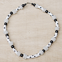 Glass beaded necklace, 'Black and White Grace' - Floral Recycled Glass Beaded Necklace in Black and White