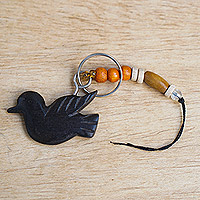 Beaded wood key chain, 'Flying Amulet' - Eco-Friendly Ebony Wood Bird Keychain with Recycled Beads