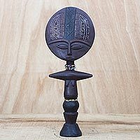 Wood fertility doll,