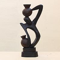 Wood sculpture Pottery Seller Ghana