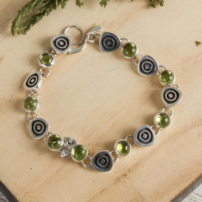 Peridot charm bracelet, Hypnotize