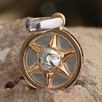 Gold accented sterling silver pendant,