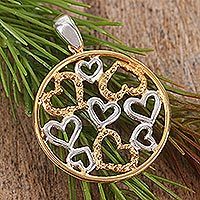 Gold accented pendant,