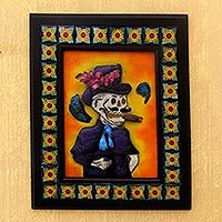 Iron and Talavera ceramic wall adornment,