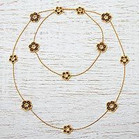 Gold plated beaded flower station necklace,