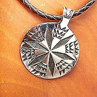 Sterling silver and leather pendant necklace,