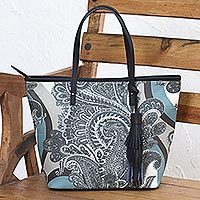 Leather accented coated canvas tote handbag,