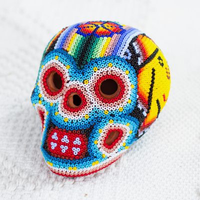 Glass beaded ceramic sculpture, Huichol Sun Skull