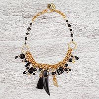 Gold plated onyx statement necklace,