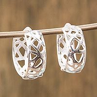 Sterling silver half-hoop earrings,