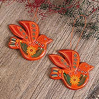 Ceramic ornaments, 'Orange Doves' (pair) - Colorful Flowers on Orange Ceramic Dove Ornaments (Pair)