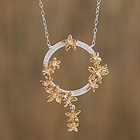 Gold accented sterling silver pendant necklace,
