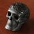 Ceramic figurine, 'Skull Tradition' - Seed Motif Barro Negro Ceramic Skull Figurine from Mexico thumbail