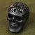 Ceramic figurine, 'Floral Cranium' - Floral Barro Negro Ceramic Skull Figurine from Mexico thumbail