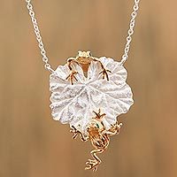 Gold accented sterling silver pendant necklace,