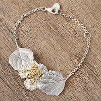 Gold accented sterling silver pendant bracelet,