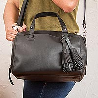 Leather travel bag, 'Tasseled Traveler in Black' - Handmade Leather Travel Bag in Black from Mexico