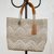 Leather accented plastic tote, 'Golden Zigzags' - White and Gold-Tone Leather Accented Plastic Tote thumbail