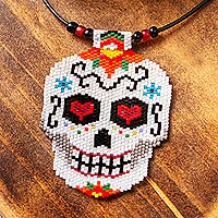 Glass beaded pendant necklace, 'White Skeleton' - Beadwork Day of the Dead White Skull Huichol Necklace