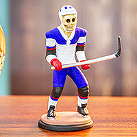 Ceramic sculpture, 'Hockey de los Muertos' - Ceramic Skeleton Hockey Player Sculpture from Mexico