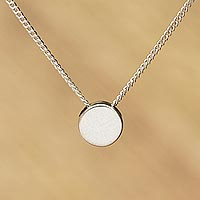 Sterling silver pendant necklace, 'Point Taken' - Round Sterling Silver Pendant Necklace