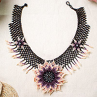 Glass beaded pendant statement necklace, 'Mauve Spring' - Handcrafted Floral Beaded Statement Necklace in Mauve